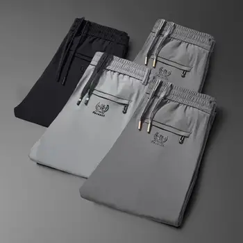 Модерни мъжки панталони Прави джобове с цип Дъна Отпусната кройка Панталони със средна талия Изображение