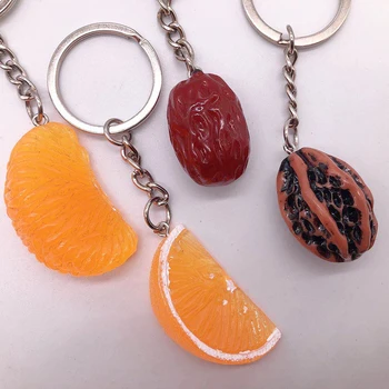 сладък симулация ядки плодове оранжев ключодържател дрънкулка проста храна сексапил жени момичета чанта висулка бижута кола аксесоари ключодържател Изображение